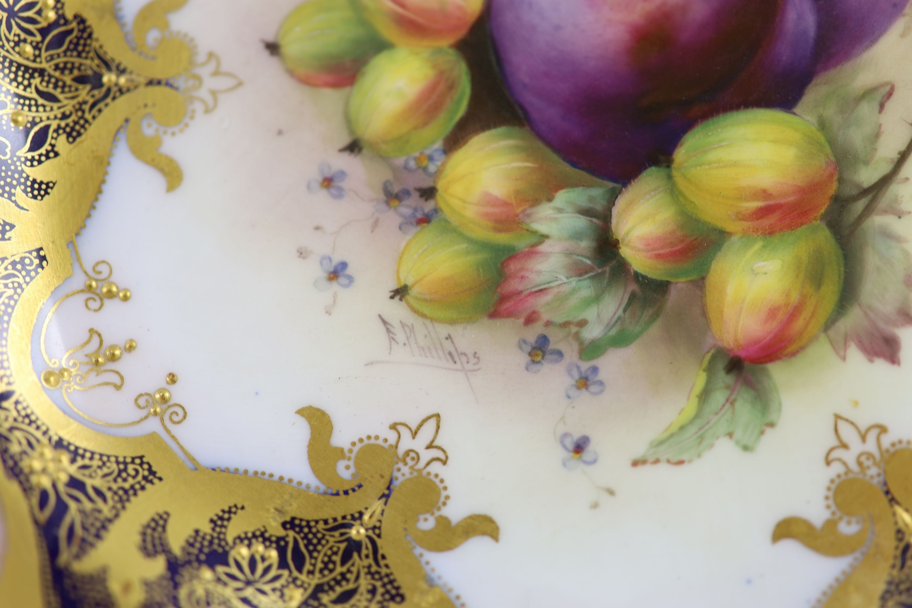 Three Royal Worcester fruit painted dessert plates, signed A. Shuck and E. Phillips, c.1918, 22.5cm diameter, two with ground off rim chip, one with tiny splinter chip